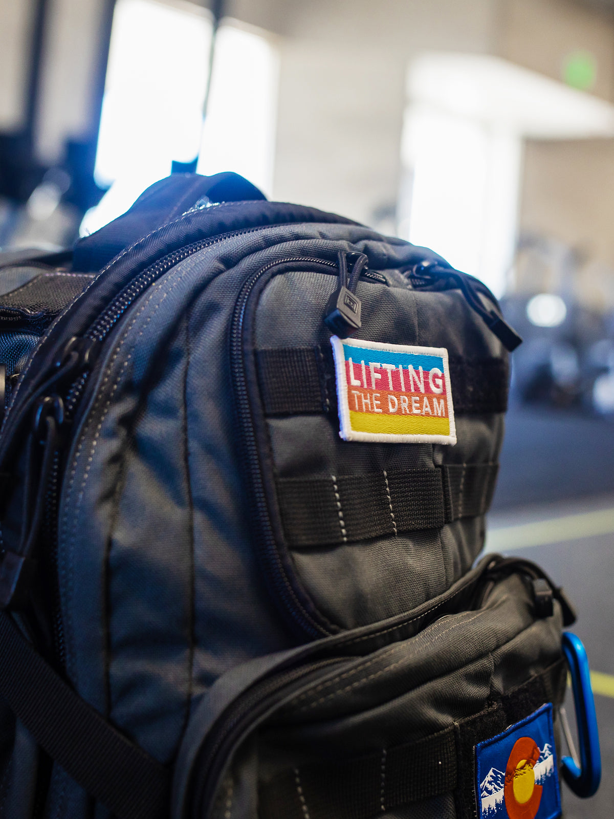 Backpack with Lifting the Dream Patch